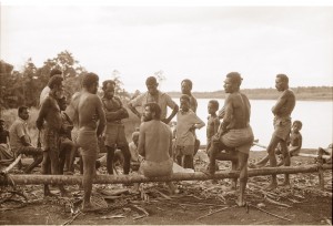Discussing the lifestyle of saltwater crocodiles on the banks of the Strickland River. Papua New Guinea, December 1979