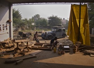 Crossing the hot plains of Gujerat to Rajasthan the wooden frame of the Rolls shrank, and on the rough roads of the Thar Desert nuts unscrewed from their bolts.  Parts fell off.   I spent a day here working with the carpenters to fix the damage.