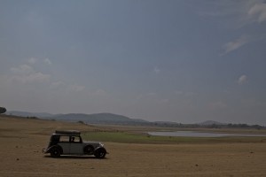 As the heat of the Indian summer settled over the sub-continent we drove north, along winding roads through the Western Ghats until we reached Mumbai, where we had started 6 months before.  We crossed this dried-up reservoir on the edge of Nagarhole National park to reach the place we stayed that night.